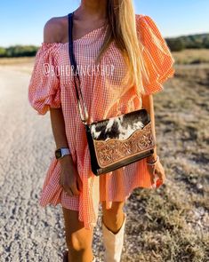 "Statement genuine cowhide leather crossbody Approx Size: 7.50\"L x 10.\"W x 2\"D * cowhide hair-on on front of purse * leather tab to zipper on the back * internal zipped pocket plus 3 credit card pockets * Beautiful hand tooled floral design flap * flap magnetic closure * genuine leather adjustable crossbody strap. It can also be removed to convert purse into a clutch. This purse can be used as a: Handbag Crossbody Shoulder Bag Clutch 3 leather colors to choose from Tan, black or brown Choose Hand Tooled Travel Clutch, Western Purses, Leather Colors, Messenger Purse, Purse Strap, Tooled Leather, Purse Bag, Leather Tooling, Crossbody Strap