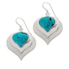 Jay King Sterling Silver Tyrone Turquoise Drop Earrings Beautiful American-mined Tyrone turquoise set into an artistic, sterling silver earring design, is sure to bring a touch of chic, artistic style to any outfit. From Jay King.       Approx. 1-11/16"L x 1-1/8"W     Stamped .925     Pierced with wire backs     Sterling silver earrings each have upside-down, bulb-shaped drops with blue-green turquoise cabochon bezel-set in center     Decorative texture   Stone Information       All sizes and we Artisan Turquoise Sterling Silver Earrings, Turquoise Sterling Silver Pierced Earrings, Nickel-free Turquoise Sterling Silver Earrings, Turquoise Sterling Silver Earrings With Ear Wire, Turquoise Sterling Silver Earrings For Pierced Ears, Turquoise Earrings In Sterling Silver, Decorative Texture, King Jewelry, Texture Stone