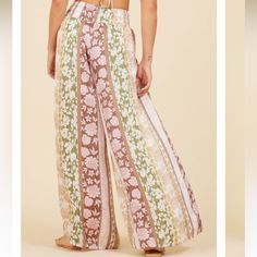 Multi Colored Tropical Flowy Pants Cream Bohemian Pants For Spring, Summer Boho Print Long Bottoms, Summer Boho Print Bottoms, Boho Print Summer Bottoms, Boho Print Long Pants For Summer, Hippie Boho Print Vacation Bottoms, Beige Full Length Bottoms For Vacation, Boho Print Hippie Pants For Vacation, Vacation Hippie Pants With Boho Print