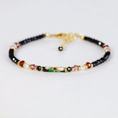 Black Spinel Gemstone and Cloisonne Stacking Bracelet. Colorful Gemstone and Cloisonne Bracelet. B188/20 - Etsy Black Bangle Jewelry With Colorful Beads, Black Bangle With Colorful Beads, Elegant Multicolor Jewelry With Black Beads, Elegant Multicolor Beaded Bracelets With Black Beads, Handmade Black Pearl Bracelet With Round Beads, Black Bohemian Bracelets With Faceted Beads, Cloisonne Bracelet, Cherry Hill, Spinel Gemstone