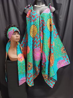 Africa Print jumpsuit with matching headwrap/belt. Colors orange, black, red, blue, teal blue, yellow, purple and maroon.  print fabric. 100% cotton. Tie strap shoulders. Step on wear or wear with top or leggins. Looks good with sandals or boots. All year round all occasions.  One size fits most Large to 3XL.  Style js01 Fitted Multicolor Headwrap For Summer, Fitted Summer Beach Headwrap, Casual Fitted Headwrap For Spring, Fitted Casual Headwrap For Spring, Spring Casual Fitted Headwrap, Casual Fitted Headwrap For Summer, Casual Multicolor Summer Headwrap, Fitted Casual Summer Headwrap, Summer Cotton Fitted Headwrap