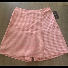 New With Tags. Shorts/ Skirt/ Skort For Golf. Gingham Mini Skort For Spring, Spring Gingham Mini Skort, Fitted Gingham Skort For Summer, Preppy Plaid Skort For Summer, Gingham Mini Skirt For Summer, Preppy Short Skort For Spring, Plaid Short Skort For Spring, Preppy Short Length Skort For Spring, Plaid Short Length Skort For Spring