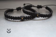 "This is a listing for braided bracelets with each 1 black initial bead with gold coloured writing. Sizes available: Kid size - S - is perfect for wrists from 11 - 14cm (4.3\" - 5.5\") Women size - M - is perfect for wrists from 14 -17cm (5.5\" - 6.7\") Men size - L - is perfect for wrists from 17 - 20cm (6.7\" - 7.9\") In case you want a different size, you can leave your wrist dimension in the 'note to seller' before checking out. When ordering a: - Bracelet set, you will get : 1 Women bracele Adjustable Black Braided Bracelet With Letter Beads, Black Macrame Jewelry For Friendship, Black Letter Beads Friendship Bracelets, Handmade Adjustable Black Name Bracelet, Black Handmade Adjustable Name Bracelet, Adjustable Handmade Black Name Bracelet, Adjustable Black Jewelry With Initials, Handmade Black Name Bracelet For Friendship, Personalized Black Braided Bracelets For Friendship