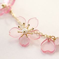 Have you been waiting for those gorgeous sakura blossoms to bloom? The wait is now over with our kawaii pink cherry blossom crystal bracelet! The perfect solution while you wait for mother Nature to get her groove on! Our ready-to-wear link chain bracelet is 15.5cm in length, with the extension chain being 7cm. Available in 3 different options, which of these lovely bracelets will you pick?! Get your kawaii pink cherry blossom crystal bracelet today! Pink Adjustable Chain Bracelet, Pink Flower Charm Bracelet For Jewelry Making, Pink Dainty Bracelet With Adjustable Chain, Dainty Pink Bracelets With Adjustable Chain, Dainty Pink Bracelet With Adjustable Chain, Pink Jewelry With Adjustable Chain For Mother's Day, Mother's Day Pink Jewelry With Adjustable Chain, Pink Flower-shaped Bracelet Gift, Cute Rose Gold Bracelet Jewelry