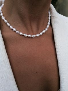 "Beautiful white baroque pearls hand knotted with 100% silk  Necklace is suitable for everyday wear thanks to smart PVD gold plated stainless steel - the gold colour does not tarnish Adjustable lenght 41,5 - 46,5 cm =  16\" - 18\" (for custom lenght write me a message first) Freshwater pearls are perfect accessory for any occasion You will recieve your bracelet nicely packed in our brand box - ready to be gifted or to be stored in" Gift Pearl Necklace With Round Beads, Elegant Everyday Beaded Pearl Necklace, Elegant Adjustable Baroque Pearl Jewelry, Handmade Minimalist Baroque Pearl Jewelry, Delicate Baroque Pearl Beaded Jewelry, Adjustable Baroque Pearl Jewelry In Pearl White, Delicate Baroque Pearl Necklace With Round Beads, Handmade Elegant Baroque Pearl Jewelry, Everyday Round Beads Pearl Necklace