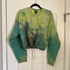 Brand New Bdg Jeans Pullover Sweatshirt In Tie Dye Wash. Bdg Jeans Logo Embroidered At Left Chest. Ribbed Crew Neckline And Cuffs. Bubble Hem With Adjustable Drawcord. Fleece Lining. 50% Cotton 50% Polyester. Size M. Brand New With Tags. Accepting All Reasonable Offers. Bundle With Other Items For A Deal! Green Crew Neck Crop Top For Streetwear, Casual Green Long Sleeve Crop Top, Green Crew Neck Cotton Crop Top, Green Cotton Crew Neck Crop Top, Casual Cotton Crop Top Sweatshirt, Green Casual Crop Top For Loungewear, Green Cotton Crop Top For Loungewear, Fisherman Knit Sweater, Oversized Black Sweater