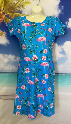 This is a beautiful modest swim dress that is perfect for ladies of all ages and sizes. The full coverage design and high-quality fabric make it a good item to wear as a swimsuit in the water or as a swim dress for the beach. This modest swimsuit is close to knee-length and has leggings attached underneath. Size Chart:  XS- chest-31-32", waist-26", hips-34"  S- chest-33-34", waist-27-28", hips-36"  M- chest-35-36", waist-29-30",hips-38"  L- chest-37-38", waist-31-33", hips-42" XL-chest-40-42", waist-34-36", hips-45" 2XL- chest-44-46", waist- 38-42", hips-50" 3XL- chest- 48-50", waist-44-48", hips-55" 4XL-chest- 52-55", waist- 48-52", hips-60" 5XL- chest- 56-60", waist- 54-58", hips-65" Fitted Printed Beachwear Dress, Printed Fitted Short Sleeve Swimwear, Fitted Short Sleeve Printed Swimwear, Fitted Floral Swim Dress, Fitted Printed Swim Skirt For Swimming, Fitted Pink Swimwear With Short Sleeves, Fitted Printed Swim Skirt, Pink Fitted Summer Swim Dress, Stretch Printed Dresses For Beach