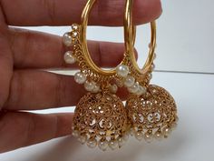 Height = 2 .5 inches Best gift option for your loved ones comes in an exquisite gift box. Highest quality and craftsmanship. Intricate Design Hoop Earrings For Wedding, Gold Chandbali Jhumkas For Wedding, Gold Dangle Jhumkas For Wedding, Gold Chandbalis With Latkans For Wedding, Temple Jewelry Style Hoop Earrings For Wedding, Temple Jewelry Hoop Earrings For Wedding Festivities, Temple Style Hoop Earrings For Wedding, Wedding Temple Jewelry Hoop Earrings With Latkans, Gold Temple Jewelry Danglers For Wedding