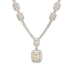 Discover unparalleled elegance with the Evita Lemon Topaz Statement Necklace in Silver. This stunning piece embodies luxury through its tennis necklace design. At its heart lies a captivating pendant drop with two distinct rectangular settings. The larger of these settings showcases a radiant lab-grown lemon topaz, surrounded by two shimmering rows of zircons. This exquisite element is seamlessly connected to a smaller rectangular setting adorned with baguette-cut zircons, encircled by a single Luxury Gemstone Tennis Necklace, Luxury Silver Gemstone Tennis Necklace, Luxury Baguette Cut Solitaire Necklace, Elegant Gemstone Tennis Necklace For Anniversary, Silver Necklace Statement, August Birthstone Jewelry, July Birthstone Jewelry, Necklace Design, Tennis Necklace