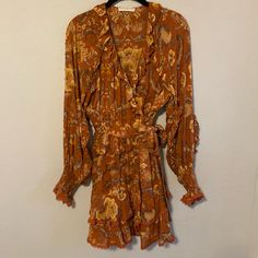 Super Cute Long Sleeve Wrap Mini Dress With Subtle Ruffle Detailing. Fun, Flirty Boho Vibe. Only Worn Once; In Perfect Condition Brown Long Sleeve Bohemian Mini Dress, Brown Long Sleeve Mini Dress For Daywear, Brown Long Sleeve Mini Dress For Beach, Bohemian Brown Dress For Date Night, Spell Dresses, Wrap Mini Dress, Play Dress, Mini Wrap Dress, Boho Vibe