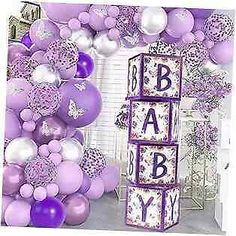 purple and white baby shower decorations