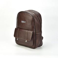 Take your essentials with you on traveling with our must-have leather backpack. This stylish leather backpack in dark brown would protect your valuables and is easy to carry. In addition, this bag, made of Cowhide leather, offers durability and protection for your daily carry. Moreover, this leather backpack has a sleek design and color. The Leather straps are soft so that you can feel comfortable. This leather backpack has a good space and can keep all your necessities, such as your laptop, ele Classic Brown Leather Backpack For Travel, Classic Brown Leather Travel Backpack, Brown Leather Backpack With Luggage Sleeve, Everyday Brown Leather Backpack With Luggage Sleeve, Modern Brown Leather Backpack With Luggage Sleeve, Brown Leather Backpack For Students, Brown Backpack With Luggage Sleeve For Everyday, Brown Business Backpack, Brown Leather Backpack For Travel