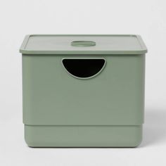 a green box with a hole in the middle