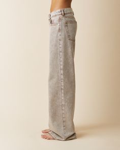 ’Kyoto’ is an effortlessly cool low waist denim with a slouchy loose flared silhouette. Featuring a zip fly, low waist and a wide leg from the thigh becoming even wider in the bottom. Made in a brown yarn dyed denim with more than 50% recycled content, finished with a heavy stonewash effect, and classic tobacco stitching. Wide Leg Flare Jeans In Beige With Five Pockets, Brown Wide Leg Denim Pants, Brown Relaxed Fit Wide Leg Jeans, Brown Washed Wide Leg Jeans, Brown Wide Leg Washed Jeans, Brown Washed Straight Leg Bottoms, Stonewashed Wide Leg Cotton Jeans, Pre-washed Cotton Jeans, High-rise Stonewashed Cotton Jeans