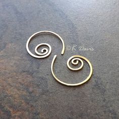 Small 14k gold filled spiral hoop earrings. Petite AND make a statement: win- win! Formed and cold forged from 20 gauge 14k gold filled wire into this small coil. The ends have been sanded for comfort in wearing, then polished to a light shine. * Small spiral hoop earrings are approximately 17mm in diameter. Please see measurement photo. You can also choose sterling silver at the dropdown to the right. If you are looking for the larger version of this style click here: https://www.etsy.com/listi Gold Minimalist Spiral Wrap Earrings, Minimalist Gold Spiral Wrap Earrings, Gold Spiral Wire Wrapped Hoop Earrings, Gold Spiral Hoop Earrings Nickel Free, Gold Spiral Hoop Earrings Nickel-free, Nickel-free Spiral Gold Hoop Earrings, Gold Spiral Hoop Earrings Gift, Gold Spiral Wrap Earrings Nickel Free, Gold Spiral Wrap Earrings With Ear Wire