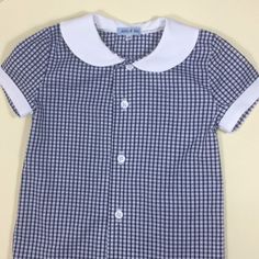 Retro styled classic gingham boys shirt. Gingham shirt with white button detail. Red, yellow, blue, black gingham. White cotton. White collar and buttons. Hand sewn finish. 6-12m Chest...29cm Nape to hem...33cm 12-18m Chest...31cm Nape to hem...35cm 18-24m Chest...32cm Nape to hem...37cm 2-3y... Chest...33cm Nape to hem...39cm 3-4y Chest...35cm Nape to hem...41cm Gift wrapped. From a smoke free and pet free home. Pageboy Outfits, Black Gingham, Boys Tops, Boys Shirt, Gingham Shirt, Gingham Dress, Dress Purchase, Little Dresses, Boys Shirts