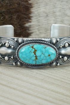 Turquoise & Sterling Silver Bracelet - Derrick Gordon – High Lonesome Trading Western Silver Bracelet With Patina, Southwestern Style Stamped Turquoise Bracelets, Southwestern Style Turquoise Stamped Bracelets, Western Turquoise Bracelet With Patina, Southwestern Stamped Turquoise Sterling Silver Bracelet, Southwestern Style Sterling Silver Turquoise Bracelet, Southwestern Turquoise Stamped Sterling Silver Bracelet, Western Turquoise Bracelet With Concho, Western Turquoise Bracelets With Concho