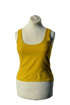 Cropped vest top handmade in small batches. Ethical and sustainable garments made here in the mountains of Portugal. Earthy, minimalist, alternative style. Created from soft stretchy cotton fleece with fluffy side out. Hand dyed with low impact colours in vibrant summer yellow with mottling. Midi length - sits above navel. Deep scoop neckline to front and back. Raw hemline. Hand or machine wash at 30'c, air dry or tumble as cotton and iron on medium setting. See size chart in last image. See more of my handmade crop tops here: https://www.etsy.com/shop/DarkWilds?ref=l2-shopheader-name&section_id=21759017 Head back to my main store page here: https://www.etsy.com/shop/DarkWilds Fitted Mustard Sleeveless Top, Mustard Fitted Sleeveless Top, Yellow Stretch Cropped Tank Top, Yellow Sleeveless Crop Top For Festival, Yellow Stretch Crop Top Tank, Yellow Fitted Tank Top, Fitted Yellow Tank Top, Yellow Cotton Crop Top Tank, Fitted Yellow Scoop Neck Top