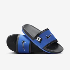 Rep the Blue Devils all the way down to your feet in these Duke slides. A cushioned synthetic leather strap features your school’s logo, while an innovative foam midsole makes this slide so comfy, you’ll never want to take it off. Nike Non-slip Slides, Comfortable Slip-resistant Sports Slides, Sporty Slip-resistant Slip-on Flip Flops, Slip-resistant Synthetic Slides, Functional Synthetic Slip-on Slides, Nike Slip-resistant Slide Sandals, Sporty Slip-on Slides For Sports, Slip-resistant Synthetic Slide Sport Sandals, Nike Sporty Slip-resistant Slides