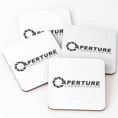 four square coasters with the logo of an appetiure laboratory on them, all in black and white