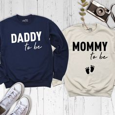 Mommy And Daddy To Be Shirts, Mommy To Be Shirt, Daddy To Be Shirt, Family Matching Hoodie, Mom and Dad Matching Sweatshirt, Mommy Daddy Tee. Our Mommy And Daddy To Be Shirts are Bella+Canvas branded. If Bella+Canvas is out of stock, I will send it from a trusted brand of the same size and quality. You can contact us in case of any problem or request. If you purchase a custom Mommy And Daddy To Be Shirts, I will send you a message to confirm the design, don't forget to check your message box. Your satisfaction is important to us :) Please check the size chart before purchase Mommy And Daddy To Be Shirts. We do not accept returns or exchanges on the Mommy And Daddy To Be Shirts unless there is a mistake or damage caused by us. Please make sure that you get the right size for yourself by loo Romantic Ideas, Matching Mom And Dad Shirts, Mommy To Be Shirt, Mommy To Be Shirts, Mom And Dad Shirts, Anniversary Shirts, Fun Baby Announcement, Mommy Outfits, Mommy To Be