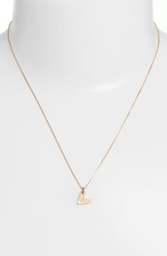 From humble beginnings to a fully staffed warehouse in Oregon, Nashelle remains true to its original purpose-handmade jewelry crafted with love and intention. The heart initial necklace is no different-with a hand-stamped pendant anchored by a single ring, it makes for a perfect layering piece. Style Name:Nashelle 14K-Gold Fill Initial Mini Heart Pendant Necklace. Style Number: 5143637. Available in stores. Everyday Initial Pendant Necklace With Heart Charm, Simple Charm Necklace For Anniversary, Minimalist Initial Pendant Necklace For Anniversary, Dainty Initial Pendant Necklace For Anniversary, Dainty Heart Pendant Initial Necklace For Everyday, Everyday Dainty Heart Pendant Initial Necklace, Gold Initial Necklace With Heart Charm For Everyday, Everyday Gold Initial Necklace With Heart Charm, Minimalist Yellow Gold Initial Necklace With Heart Charm