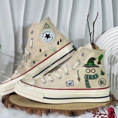 🌿 Love Embroidered Converse 🌿 ❤️ About Our Products: Each pair of shoes from our store is brand new and hand-embroidered to order. Please ensure you select the correct shoe size before checkout. The embroidery is durable and won't fade over time. ✨ Personal Expression: Showcase your unique style with custom embroidery! Contact me to create your own embroidered shoes with a private listing. I'll send you the design for approval before embroidering the shoes. Alternatively, you can design your p Harry Potter Converse, Converse Hightops, Converse Embroidery, Embroidered Converse, Iconic Symbols, Embroidered Shoes, Harry Potter Diy, Magical World, Converse High Tops