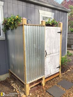 an old shed is being used as a planter