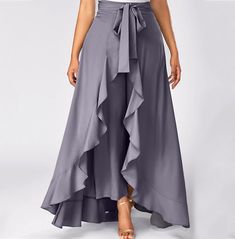 Create a stunning look with this sleek and stylish long skirt from our collection. this high-waisted skirt features an asymmetric ruffled hem for a unique, eye-catching style perfect for any occasion. shop now for the perfect addition to your wardrobe. Pants Skirt, Solid Color Pants, Party Dress Long Sleeve, Grey Tie, Puff Sleeve Dresses, Ankle Length Pants, Party Dress Long, Boho Maxi Dress, Ruffle Skirt