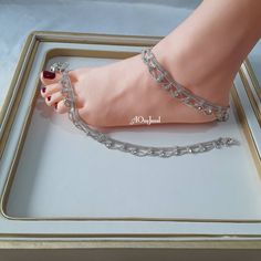 Beautiful handcrafted Indian silver plated Clear CZ Crystal Zircon pair of anklets traditionally called payals or ghanjar. Stunning multi layer design anklets. It is a beautiful ornament worn around the ankle. You can worn it on one foot or as a pair on both feet. It is sure to make your feets look beautiful. Main Colour: Silver Length: 26cm Closer: Hook clasp with bells. Package Includes: 1 pair of anklets Wedding Toe Ring Metal Anklets, Jhanjar Anklets, Anklets Silver, Bridal Anklet, Wedding Anklets, Wedding Necklace Set, Sapphire Necklace Pendants, Anklets Boho, Bridal Necklace Set