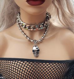 This listing is just for the handmade chunky Stainless Steel ball chain goth choker with bug skull pendant. A link to the other chain choker is below. This is a stunning piece of alternative punk fashion that will elevate any outfit with its bold and edgy look.  Oversized 10mm stainless steel ball chain & skull pendant (18")   Makes a great gift for the special woman in your life who loves to express herself through bold and unique fashion choices. DETAILS: ❤ Premium shiny polished stainless ste Metal Halloween Choker Jewelry, Halloween Metal Choker Jewelry, Punk Necklace With Adjustable Chain For Halloween, Handmade Punk-style Choker Jewelry, Handmade Punk Style Jewelry Choker, Handmade Punk Metal Jewelry, Handmade Punk Style Choker, Punk Style Handmade Choker Jewelry, Punk Style Choker Jewelry For Halloween