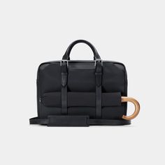 Part of our Archive Collection, this is the prior model of our award-winning Cary Briefcase in the streamlined Slim size — on sale while supplies last. Modern Black Briefcase With Leather Trim, Black Leather Trim Briefcase For Work, Black Leather Trim Briefcase, Black Briefcase With Leather Trim For Work, Modern Formal Briefcase With Leather Handles, Modern Office Briefcase With Palladium Hardware, Classic Formal Briefcase With Leather Trim, Black Leather-trimmed Briefcase For Business, Black Leather Trim Briefcase For Business