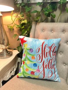 a christmas tree pillow sitting on top of a chair