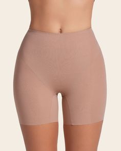 This all-in-one shaper short does it all! It's made of our trademark DuraFit® moderate compression fabric - double-layered in the top to flatten your tummy, single-layered in the legs for seamless smoothing. Removable contour padding adds a natural-looking lift and volume to your backside; you can also wear this without the padding for a natural look and a traditional shaper short effect. This short is designed to go undetectable under your clothes, featuring laser-cut leg bands and a waistband Solid Shapewear With Built-in Shorts, Compression Shapewear With Seamless Construction, Beige Shapewear With Built-in Bra, Short Length, Fitted Seamless Shapewear With Short Inseam, Seamless Fitted Shapewear With Short Inseam, Fitted Shorts With Built-in Bra, Mid-thigh Length, Fitted Shapewear With Built-in Bra Short Length, Compression Shapewear With Built-in Shorts, Compression Shapewear With Built-in Bra And Short Leg