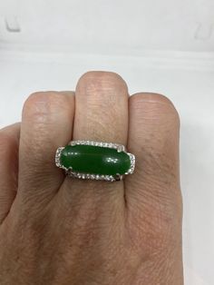 Vintage Lucky Green Nephrite Jade ring Large green nephrite jade Ornate German Silver Vintage ring, does not tarnish, NOT sterling Size 7 only My jeweler can custom re size for a $10-$20 fee All rings are shipped free in the US in a nice gift box. Check out our over a THOUSAND great reviews Engraving is $4 per letter and is not always perfect depending on the piece. It can take a few days if the jeweler is busy. This is payable to Paypal Judithsltd@gmail.com Green Gemstone Ring With Stone Setting, Oval Green Diamond Ring With Vs Clarity, Vintage Jade Ring, Vintage Jade Ring As Gift, Heirloom Green Jade Rings, Vintage Round Jade Rings, Antique Silver Jade Ring, Lucky Green, Nephrite Jade