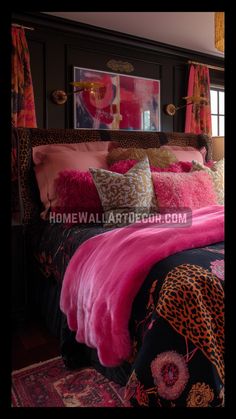 a bed with pink and black comforters in a bedroom