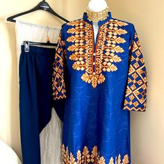 Pakistani Rivaaj! Navy Blue Outfit Chest 40 Waist 40 Hips 48 Sleeves 17 Back Shoulder 15 Length Of Shirt 35 Trousers 37 Blue Straight Kurta With Floral Embroidery, Blue Floral Embroidered Straight Kurta, Blue V-neck Sets With Resham Embroidery, Unstitched Blue Sets With Floral Embroidery, Blue Traditional Wear With Intricate Embroidery For Spring, Spring Blue Traditional Wear With Intricate Embroidery, Blue Straight Kurta Set With Intricate Embroidery, Elegant Blue V-neck Kurta, Unstitched Blue Traditional Wear For Spring