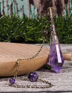 Clear Amethyst  Crystal Pendulum,Polished Gemstone Necklace,Healing Dowsing Energy Balancing,Rose Pendulum,Rose Pendant,Reiki,Chakra,JewelrySize: 70 mmChain Color: Copper/SilverPick at random. Lavender Spiritual Crystal Pendant Necklace, Lavender Pendant Crystal Necklace For Spiritual Use, Lavender Spiritual Crystal Necklace For Gift, Spiritual Purple Jewelry For Festivals, Mystical Purple Jewelry For Meditation, Mystical Purple Crystal Necklace For Healing, Purple Spiritual Crystal Necklace, Purple Spiritual Mineral Crystal Necklace, Purple Spiritual Crystal Necklace For Festivals