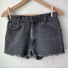 Vintage Orange Tab Levi's Cut Off Denim Shorts. Vintage Student Levi Jeans that have been cut into shorts. High waisted. Charcoal grey acid wash color. Size 28. Excellent condition. Acid Wash Jean Shorts With Frayed Hem, Distressed Washed Black Cutoff Jean Shorts, Washed Black Denim Cutoff Shorts, Washed Black Cotton Cutoff Shorts, Summer Washed Black Cutoff Shorts, Trendy Gray Cotton Jean Shorts, Gray Jean Shorts For Summer, Gray Cutoff Jean Shorts For Spring, Distressed Washed Black Shorts