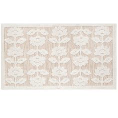 a white rug with an intricate design on the front and back of it, in neutral tones