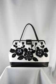 Hey, I found this really awesome Etsy listing at https://www.etsy.com/listing/209325964/casual-leather-bag-black-and-white Luxury Floral Embroidered Rectangular Shoulder Bag, Luxury Floral Embroidery Rectangular Shoulder Bag, Elegant Embroidered Top Handle Satchel, Elegant Satchel Shoulder Bag With Floral Embroidery, Elegant Shoulder Bag With Top Handle And Floral Embroidery, Elegant Floral Embroidered Satchel Shoulder Bag, Elegant Floral Embroidered Top Handle Shoulder Bag, Embroidered Leather Evening Bag, Rectangular Leather Bag With Floral Embroidery