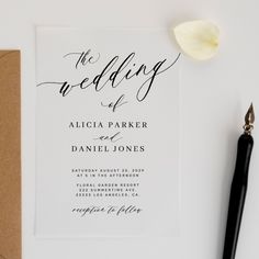 Minimalist romantic classy calligraphy script simple transparent acrylic wedding invitation.