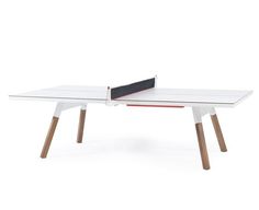 a ping pong table with two paddles on it