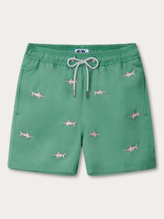 Men's Staniel Swim Shorts with pink swordfish motifs on green fabric. Mens Resort Wear, Changing Of The Guard, The Guard, Swimming Shorts, Mens Swim Shorts, Holiday Essentials, Holiday Wardrobe, Mens Swim Trunks, Swim Shorts