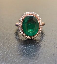 18K Rose Gold Halo Diamond Colombian Emerald Engagement Ring - Handmade Rose Gold Halo Emerald Diamond Wedding Ring by DeKaraDesigns on Etsy https://www.etsy.com/listing/716341912/18k-rose-gold-halo-diamond-colombian Luxury Emerald Ring With Halo, Luxury Emerald Ring With Halo And Round Cut, Luxury Formal Emerald Ring With Halo Design, Luxury Rose Gold Emerald Ring With Diamonds, Luxury Rose Gold Emerald Diamond Ring, Heirloom Style Emerald Ring With Halo For Formal Occasions, Luxury Emerald Rings With Halo Design, Luxury Round Emerald Ring With Halo, Luxury Emerald Ring With Prong Setting For Wedding