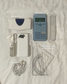 the contents of an electronic device laid out on a bed