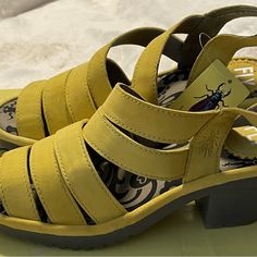 Fly London Woze118fly Bright Yellow Woze Leather Sandal Size 35 Nib Low Heel Leather Footbed Heels For Spring, Spring Low Heel Shoes With Leather Footbed, Spring Block Heel Sandals With Leather Footbed, Spring Block Heel With Leather Footbed, Spring Leather Block Heel Shoes, Spring Block Heel Heels With Leather Footbed, Yellow Leather Heels With Cushioned Footbed, Casual Yellow Leather Heels, Yellow Casual Sandals With Low Heel