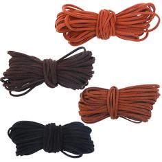 three different colors of rope are shown in this image, one is brown and the other is black