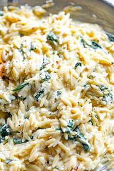 pasta with spinach and cheese in a bowl