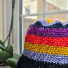 Let's say hello to this colourful bucket hat. Definitely able wearable anytime and at all times as you choose. Handmade of 100% Acrylic yarn that appears summer-rryy but is also suitable for a cold day. Let it with your everyday OOTD or we can have it wrapped as a gift too. Dimensions: Length (Top of hat to end of brim) : 9 1/2 in or 24.1cm Adult size of 20-22 in head circumference Casual Colorful Bucket Hat, Colorful Casual Bucket Hat, Colorful Casual Bucket Sun Hat, Casual Colorful Bucket Sun Hat, Trendy Yarn Bucket Hat, One Size Fits Most Multicolor Summer Bucket Hat, Multicolor One Size Fits Most Summer Bucket Hat, Summer Multicolor One Size Fits Most Bucket Hat, Summer Multicolor Bucket Hat